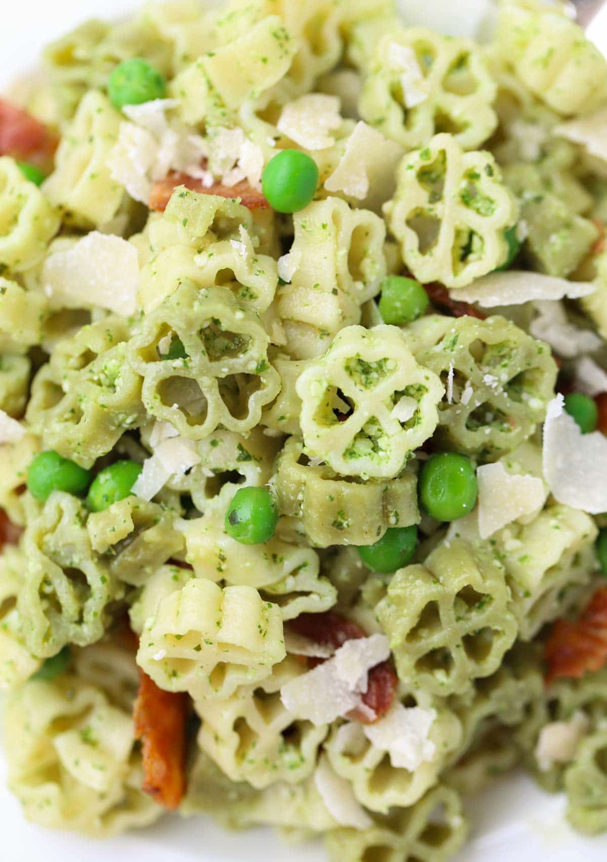 Arugula and Lime Pesto Pasta | A tangy and delicious combo for pesto! Add bacon, green peas, and make it your own! Yum! | WorldofPastabilities.com