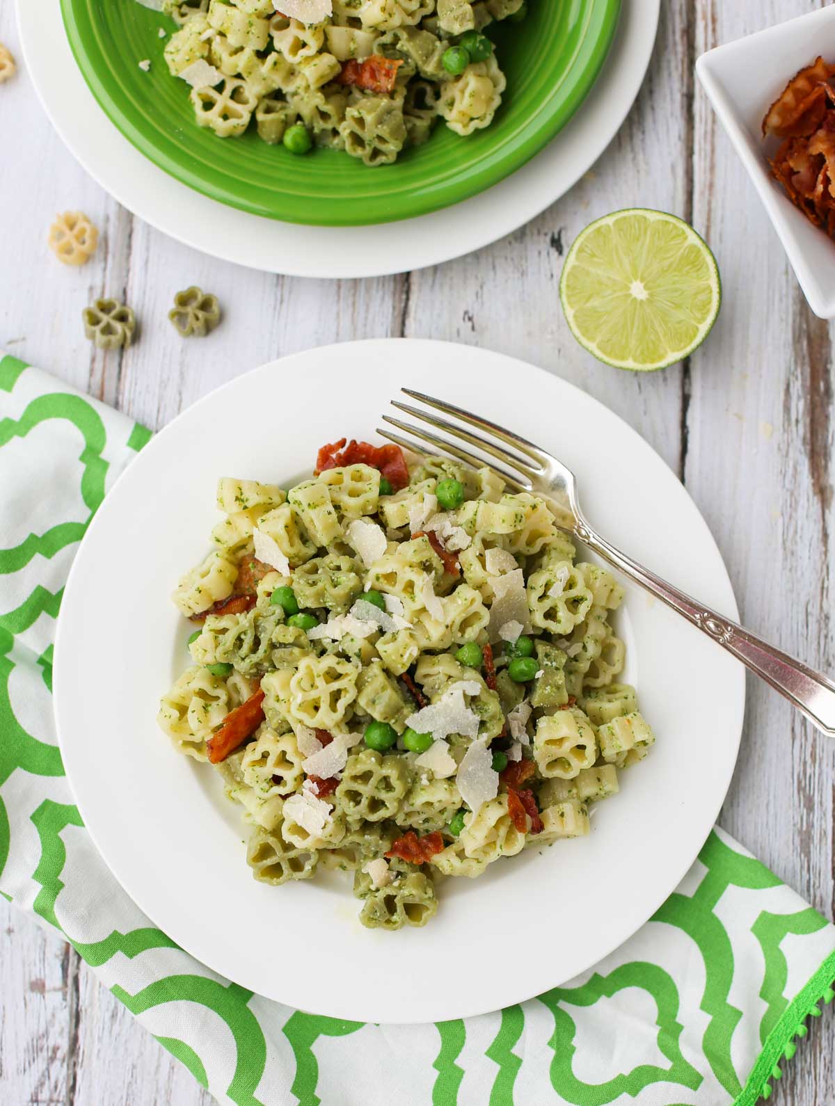 Arugula and Lime Pesto Pasta | A tangy and delicious combo for pesto! Add bacon, green peas, and make it your own! Yum! | WorldofPastabilities.com