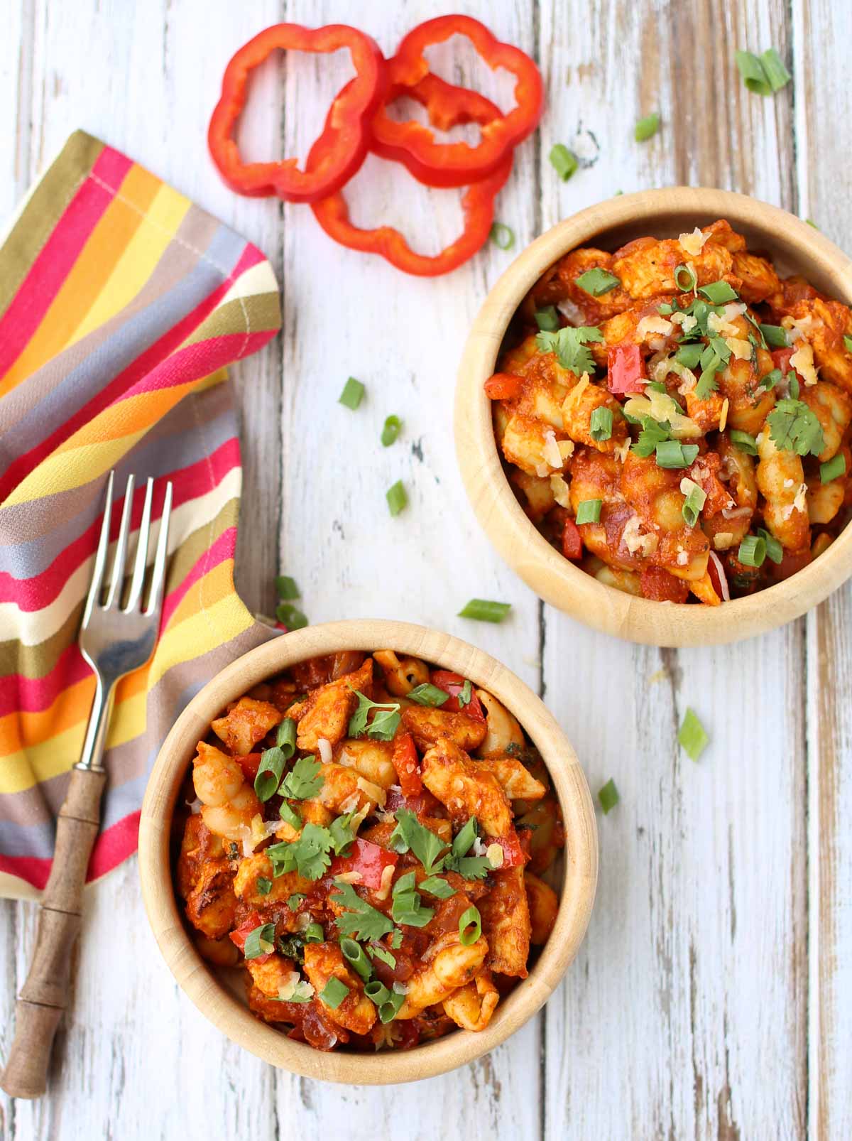 BBQ Chicken Pasta | Comfort food at its best! Cooked chicken with a marinara & BBQ sauce blend...topped with shredded gouda and provolone! Yum! and don't forget the chopped cilantro and green onions! | WorldofPastabilities.com