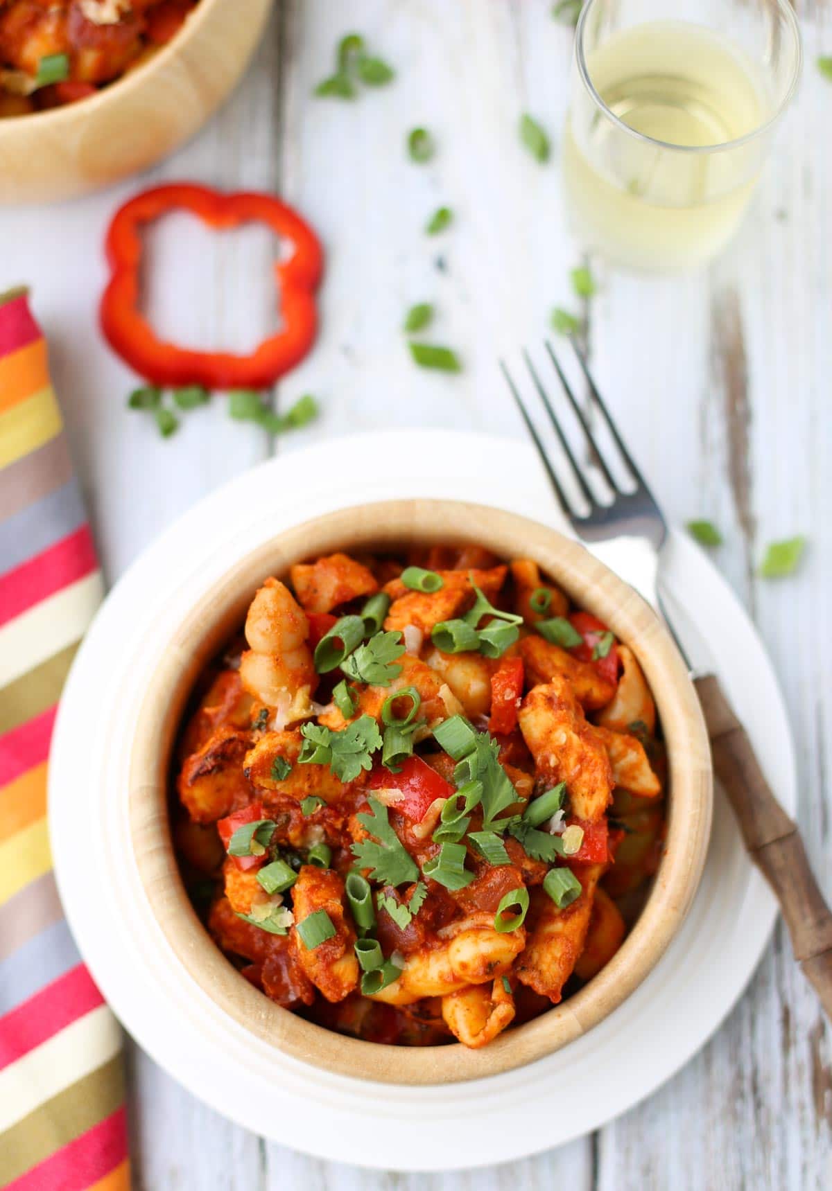 BBQ Chicken Pasta | Comfort food at its best! Cooked chicken with a marinara & BBQ sauce blend...topped with shredded gouda and provolone! Yum! and don't forget the chopped cilantro and green onions! | WorldofPastabilities.com