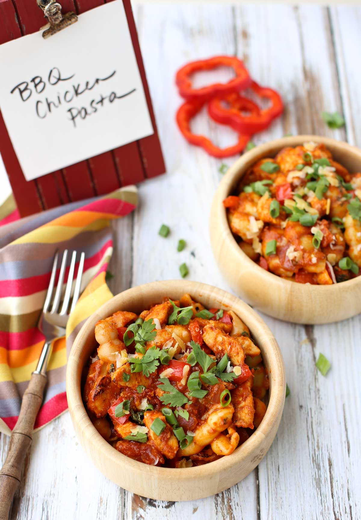 BBQ Chicken Pasta | Comfort food at its best! Cooked chicken with a marinara & BBQ sauce blend...topped with shredded gouda and provolone! Yum! and don't forget the chopped cilantro and green onions! | WorldofPastabilities.com