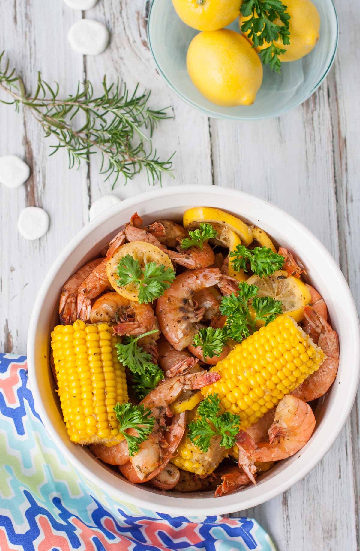 Bayou Shrimp Pasta | WorldofPastabilities.com | Zesty Cajun Bayou Shrimp Pasta is the must do beach recipe! Simple to make it delivers a ton of flavor. Get messy and have fun with the entire family!