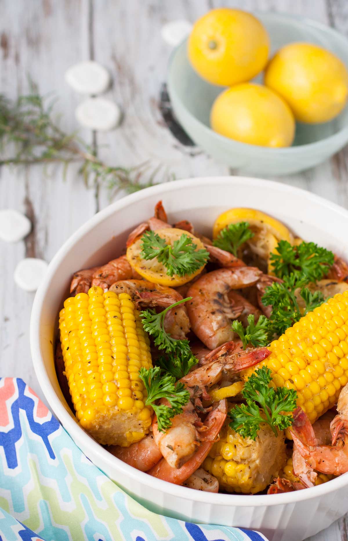 Bayou Shrimp Pasta | WorldofPastabilities.com | Zesty Cajun Bayou Shrimp Pasta is the must do beach recipe! Simple to make it delivers a ton of flavor. Get messy and have fun with the entire family!