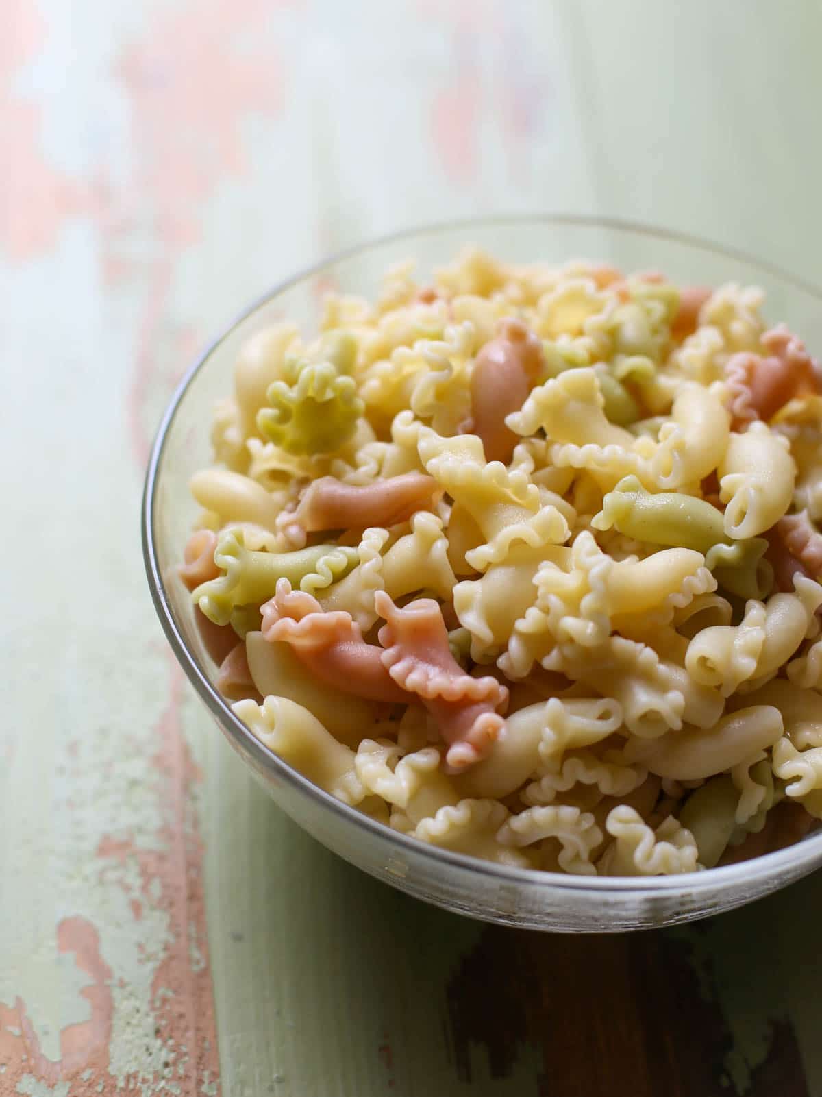 Caprese Pasta Salad | WorldofPastabilities.com | The perfect summer salad is fresh, simple, and a crowd favorite! You'll make this over and over!