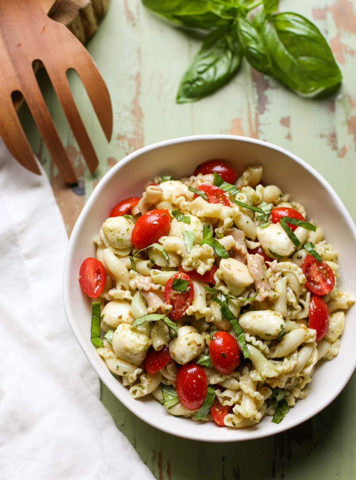 Caprese Pasta Salad | WorldofPastabilities.com | The perfect summer salad is fresh, simple, and a crowd favorite! You'll make this over and over!