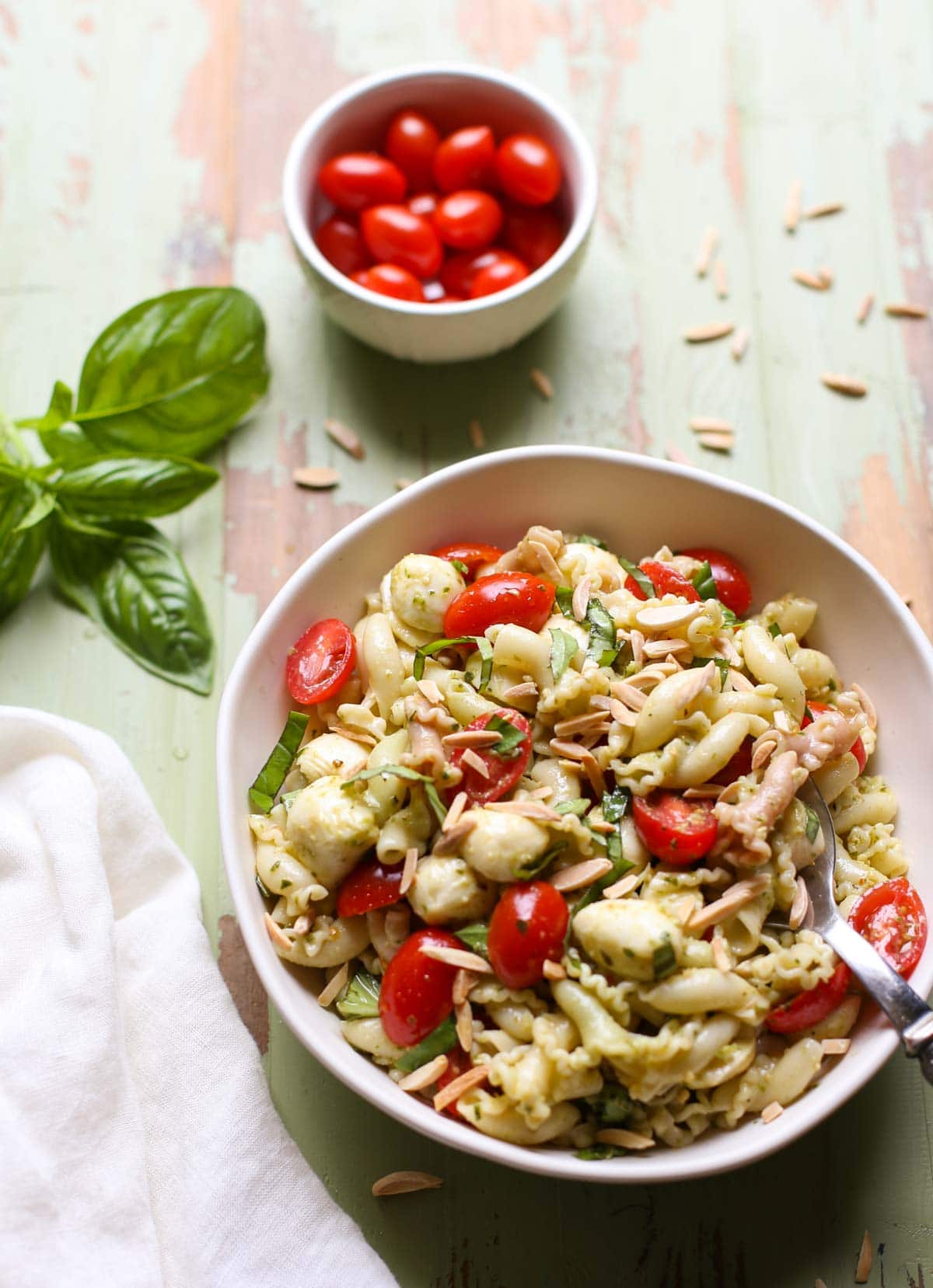 Caprese Pasta Salad | WorldofPastabilities.com | The perfect summer salad is fresh, simple, and a crowd favorite! You'll make this over and over!