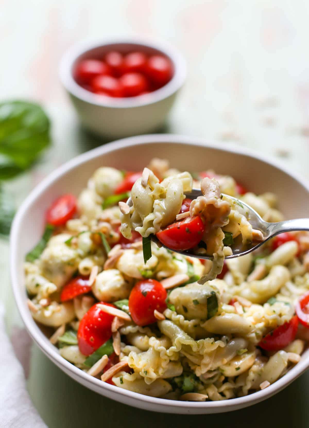 Caprese Pasta Salad | WorldofPastabilities.com | The perfect summer salad is fresh, simple, and a crowd favorite! You'll make this over and over!