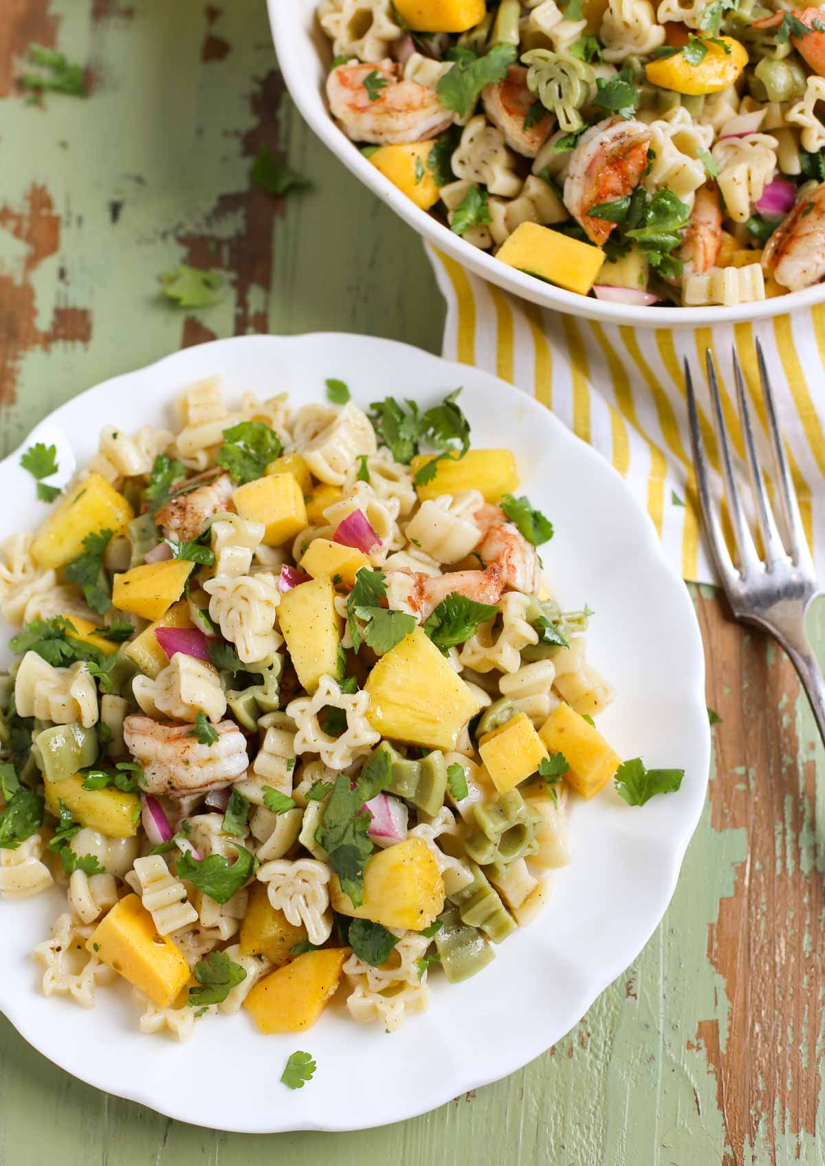 Close up of Caribbean Pasta with Plate and Bowl Showing