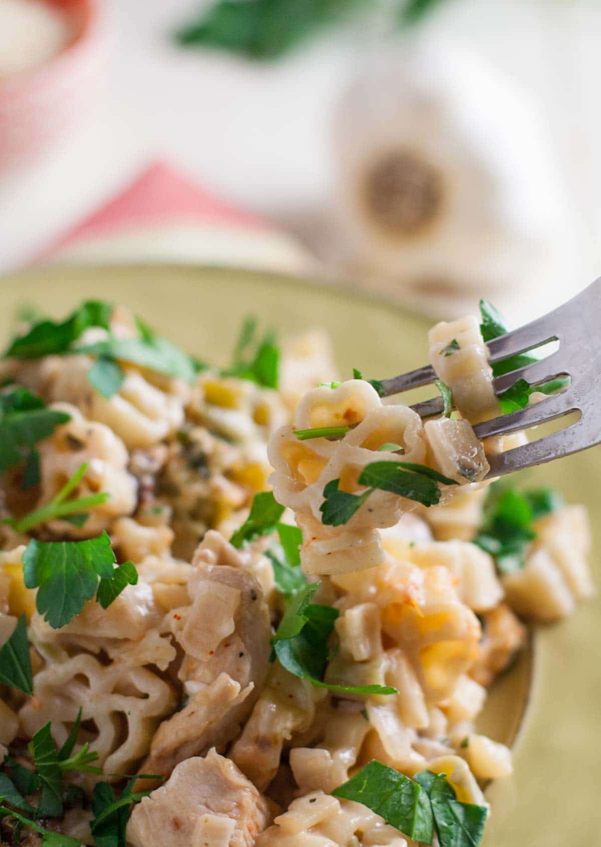 Creamy Chicken and Sun Dried Tomato Pasta | WorldofPastabilities.com | Delicious updated chicken casserole with bursts of flavor! Can be made ahead or frozen for later. Yum!