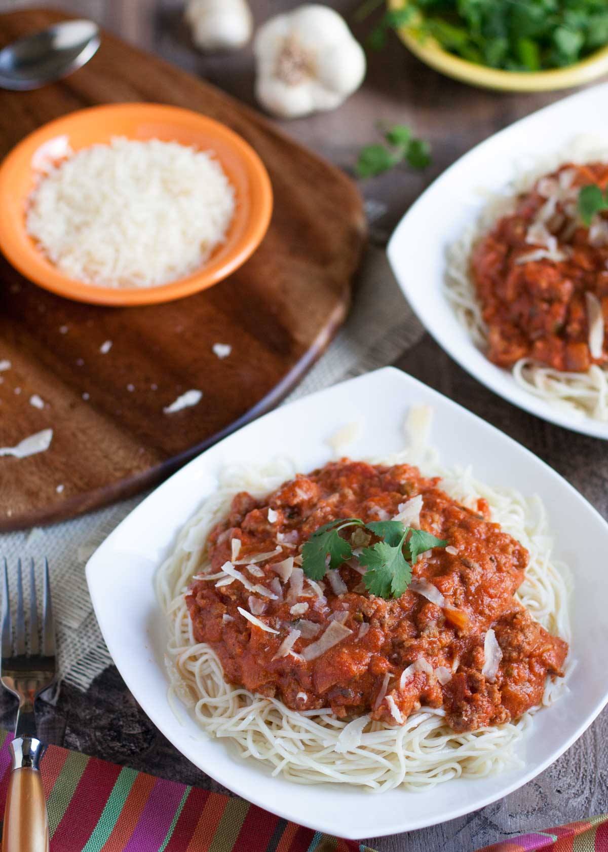 Creamy Taco Bolognese | WorldofPastabilities.com | Flavorful combo of traditional bolognese with fresh jalapenos, cilantro, taco seasoning, and sour cream...your taste buds and family will thank you!