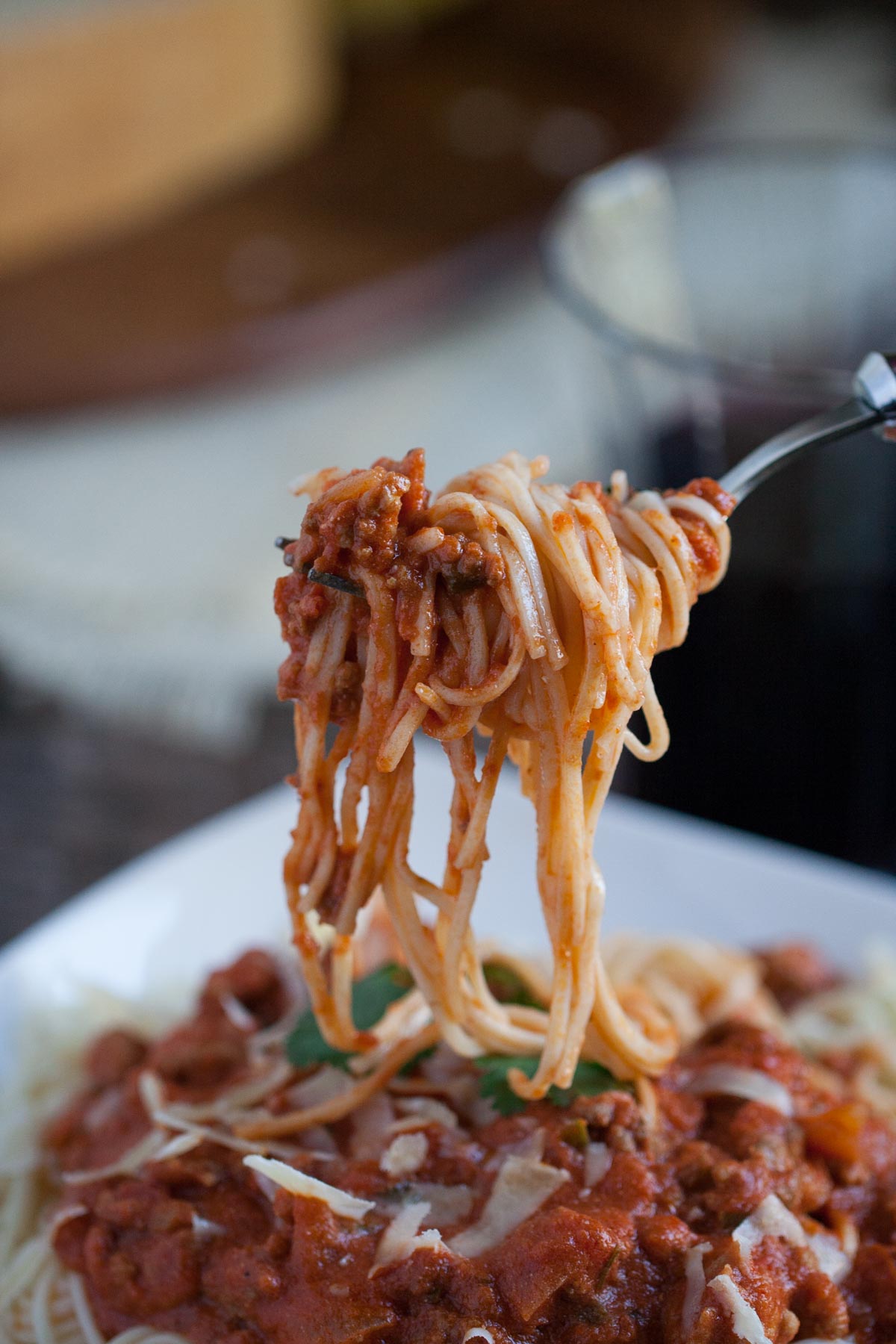 Creamy Taco Bolognese | WorldofPastabilities.com | Flavorful combo of traditional bolognese with fresh jalapenos, cilantro, taco seasoning, and sour cream...your taste buds and family will thank you!