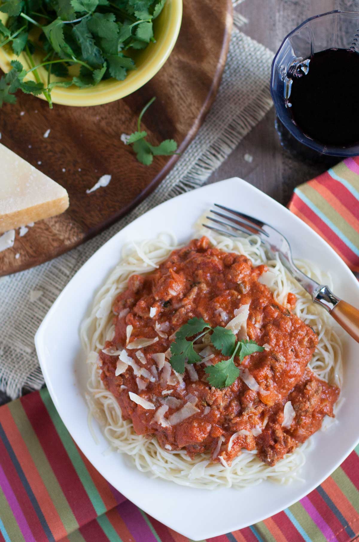 Creamy Taco Bolognese | WorldofPastabilities.com | Flavorful combo of traditional bolognese with fresh jalapenos, cilantro, taco seasoning, and sour cream...your taste buds and family will thank you!