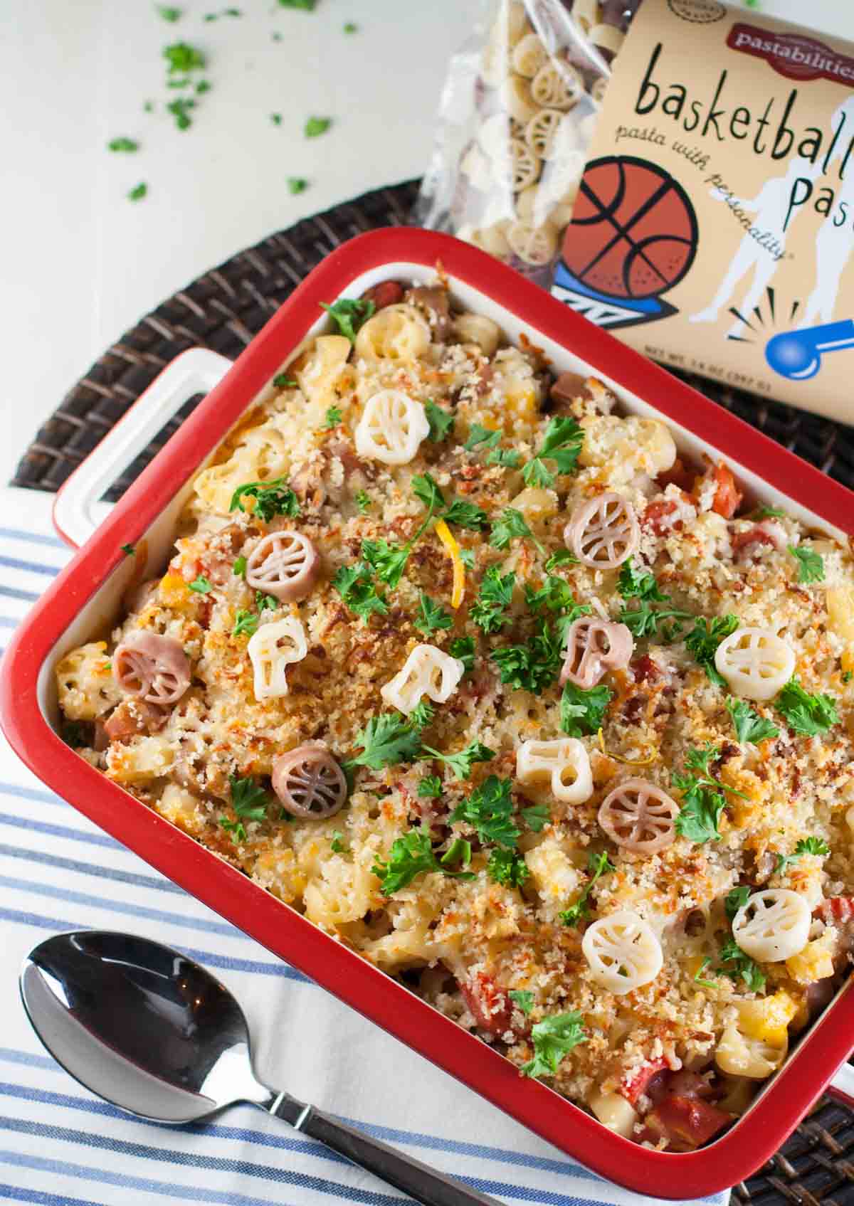 Light Mac and Cheese with Tomatoes | WorldofPastabilities.com | Fabulous mac and cheese side dish lightened up with less butter. Great flavor with herbs and panko on top!