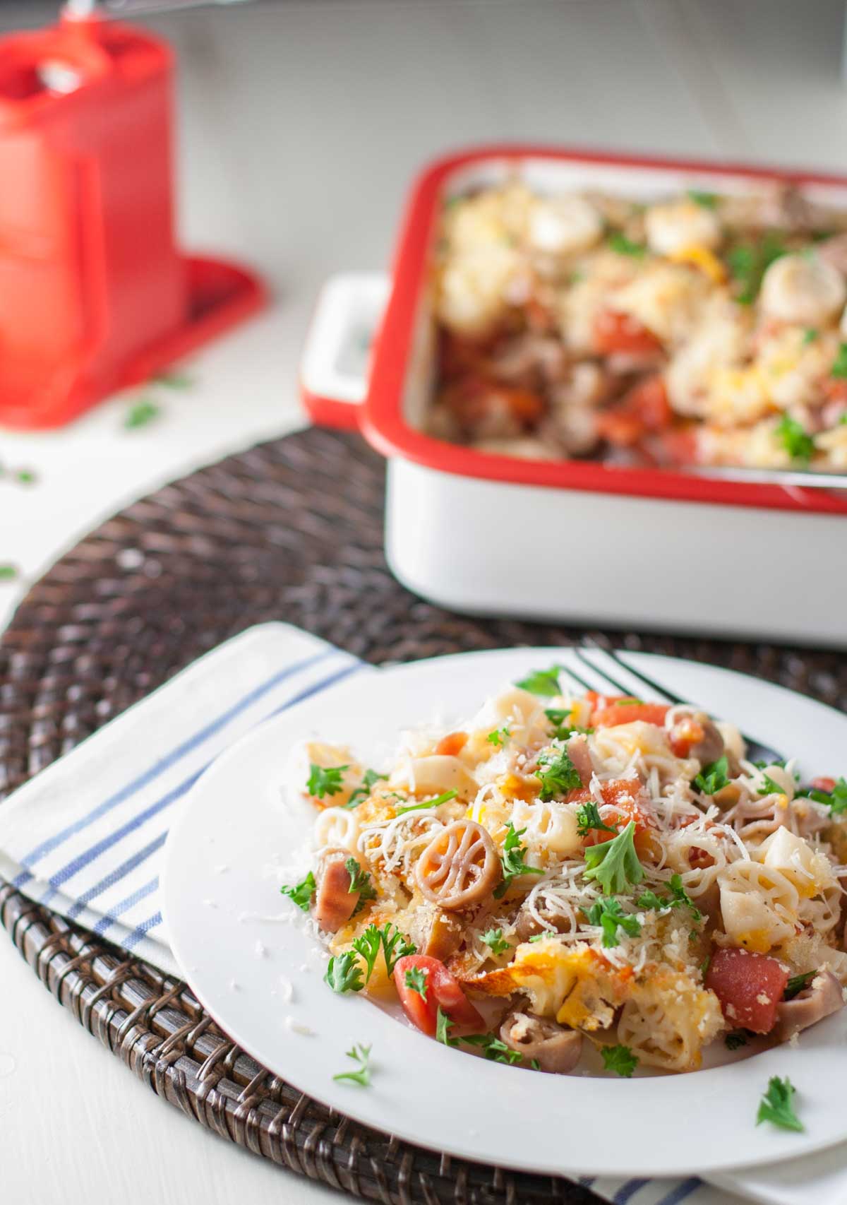 Light Mac and Cheese with Tomatoes | WorldofPastabilities.com | Fabulous mac and cheese side dish lightened up with less butter. Great flavor with herbs and panko on top!