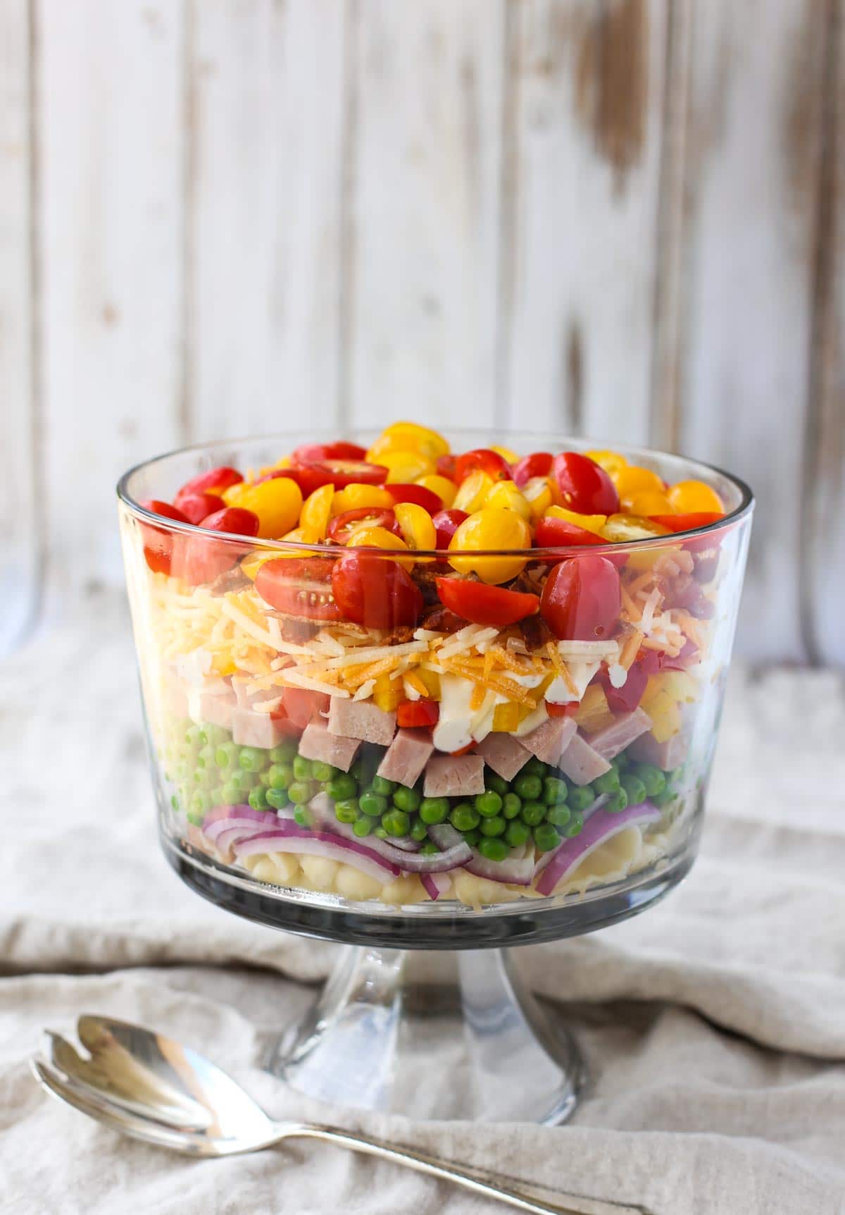 Nine Layer Pasta Salad | Nine layers of fresh textures and flavors combine to make a delicious pasta salad! A beautiful presentation that will wow your guests. Simple and Yum! | WorldofPastabilities.com