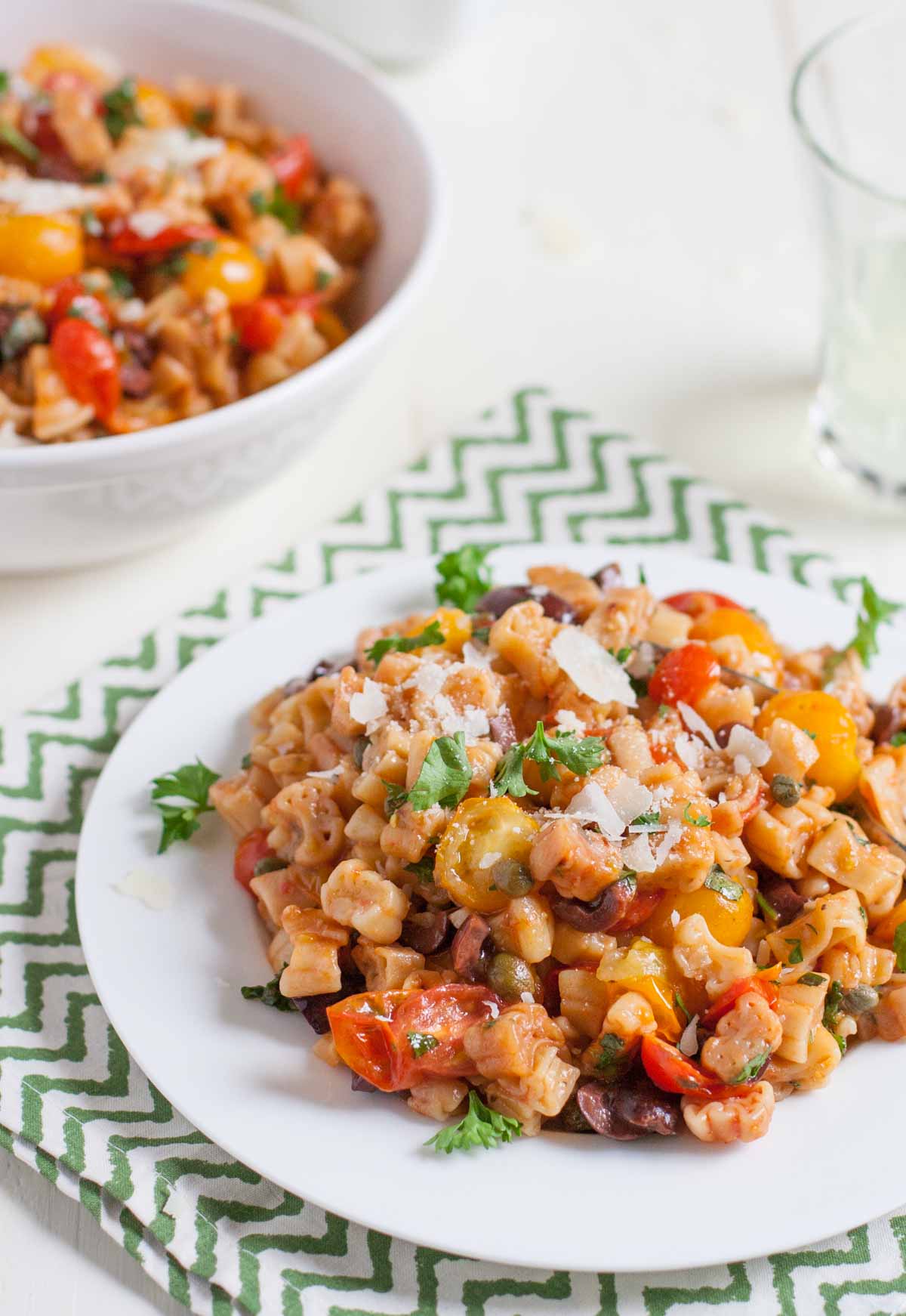 One Pot Pasta Puttanesca | WorldofPastabilities.com | Bright fresh flavors add zest to this traditional Italian dish. One pot makes it simple and easy!