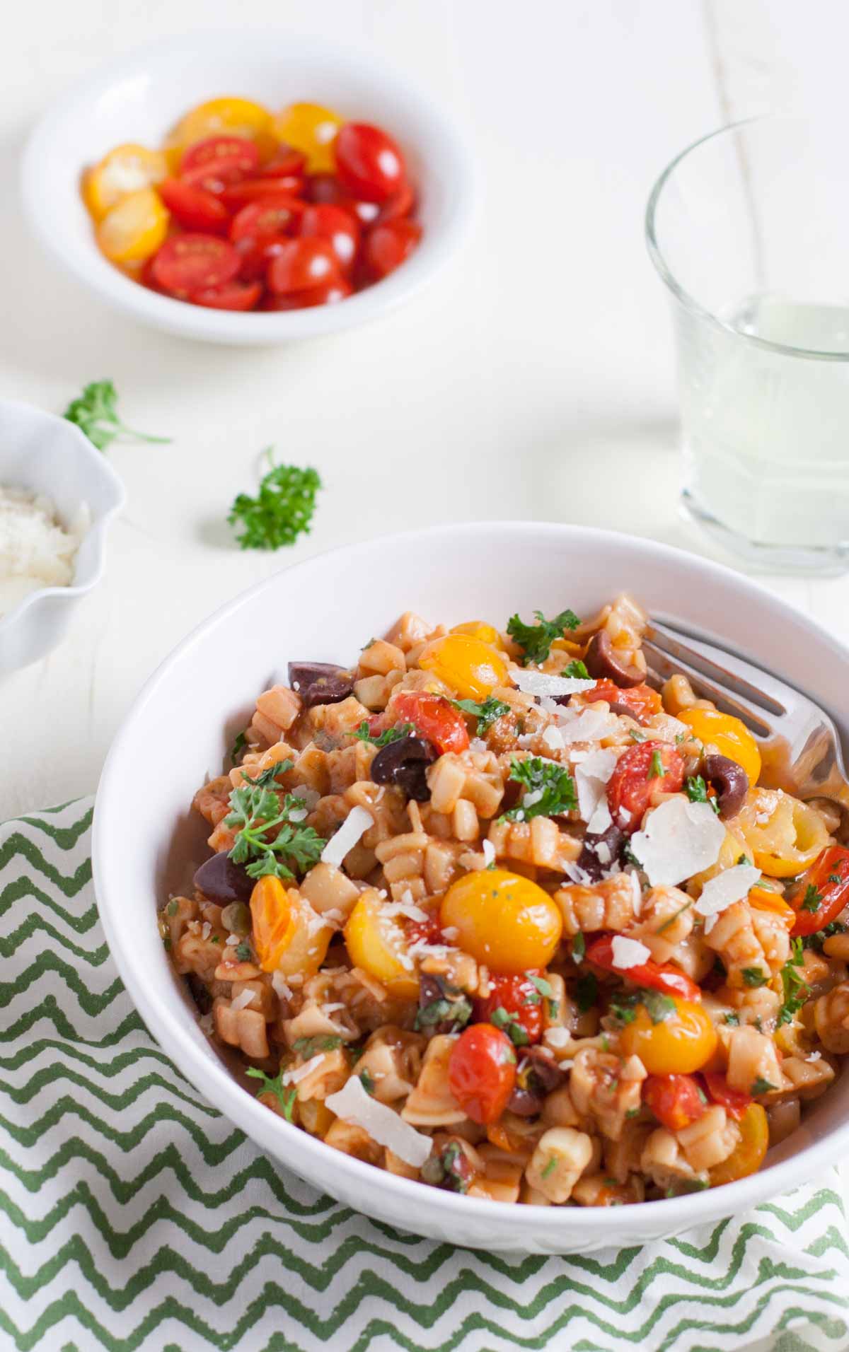 One Pot Pasta Puttanesca | WorldofPastabilities.com | Bright fresh flavors add zest to this traditional Italian dish. One pot makes it simple and easy!
