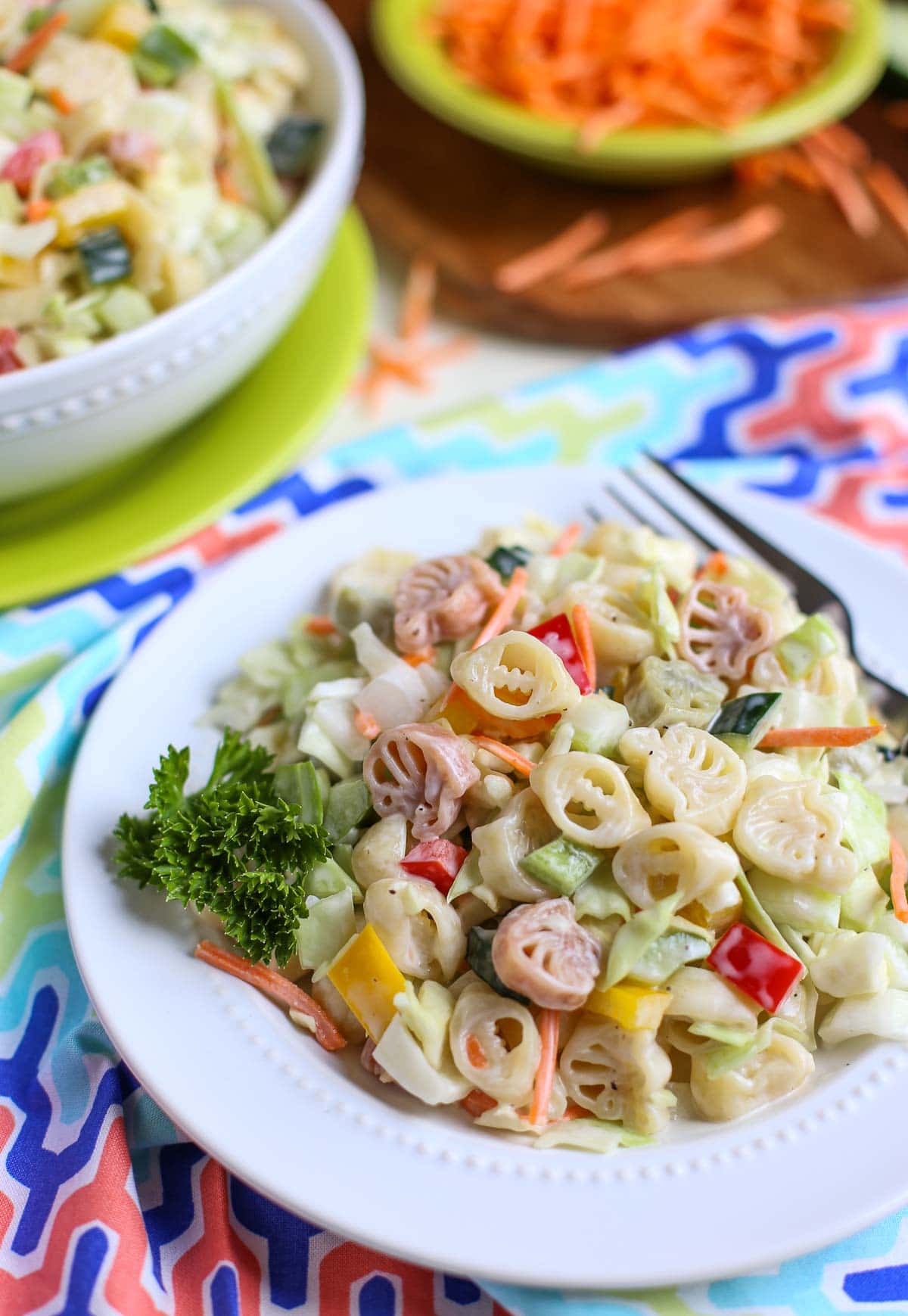 Pasta Slaw | BBQ's favorite side just got better! Pasta, cabbage, peppers, celery, etc plus a sweet and tangy sauce - it's a Wow! } WorldofPastabilities.com