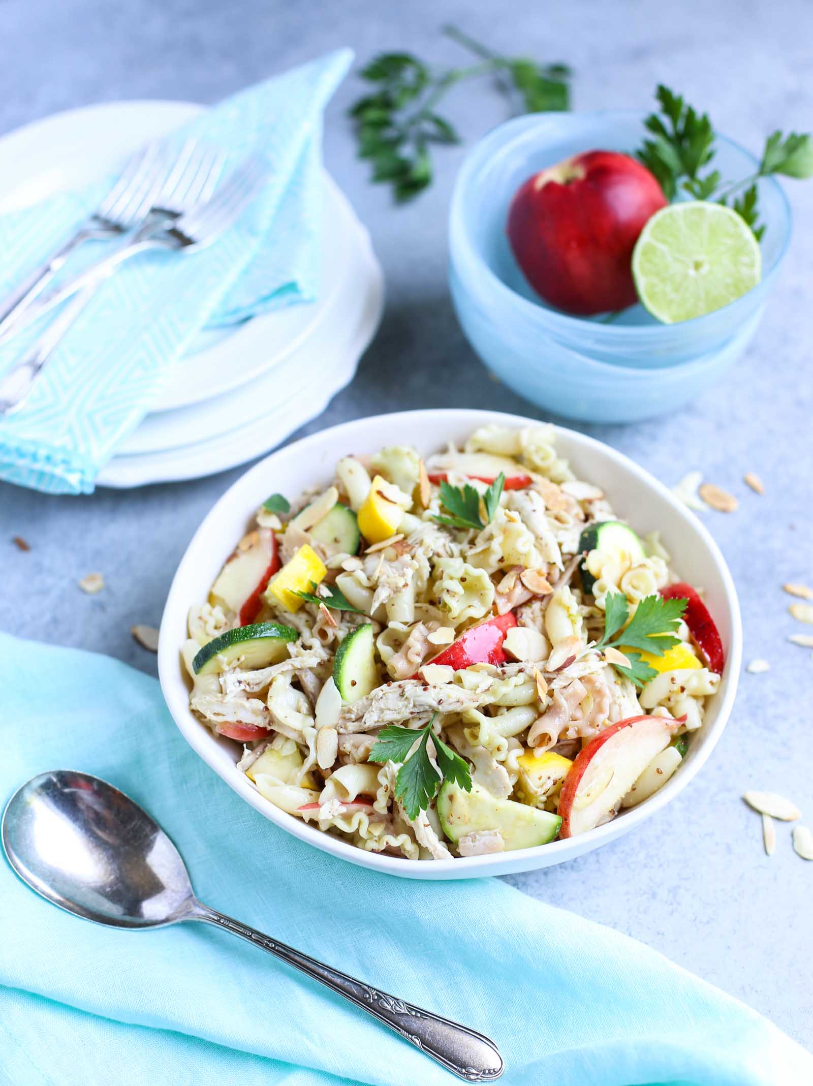 Summertime Chicken Pasta Salad with Nectarines & Squash | Tangy Lime Vinaigrette ties together a delicious unexpected surprise! Perfect as a main course and perfect for summer! Simple and delish! | WorldofPastabilities.com