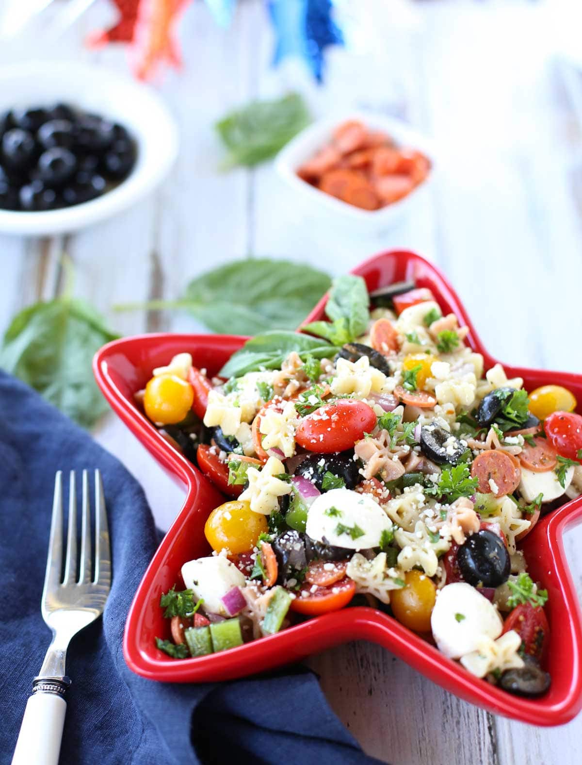 Supreme Pizza Pasta Salad | Delish combo of your favorite pizza ingredients! A simple side dish to any summer menu. Yum! The vinaigrette dressing ties it all together! | WorldofPastabilities.com