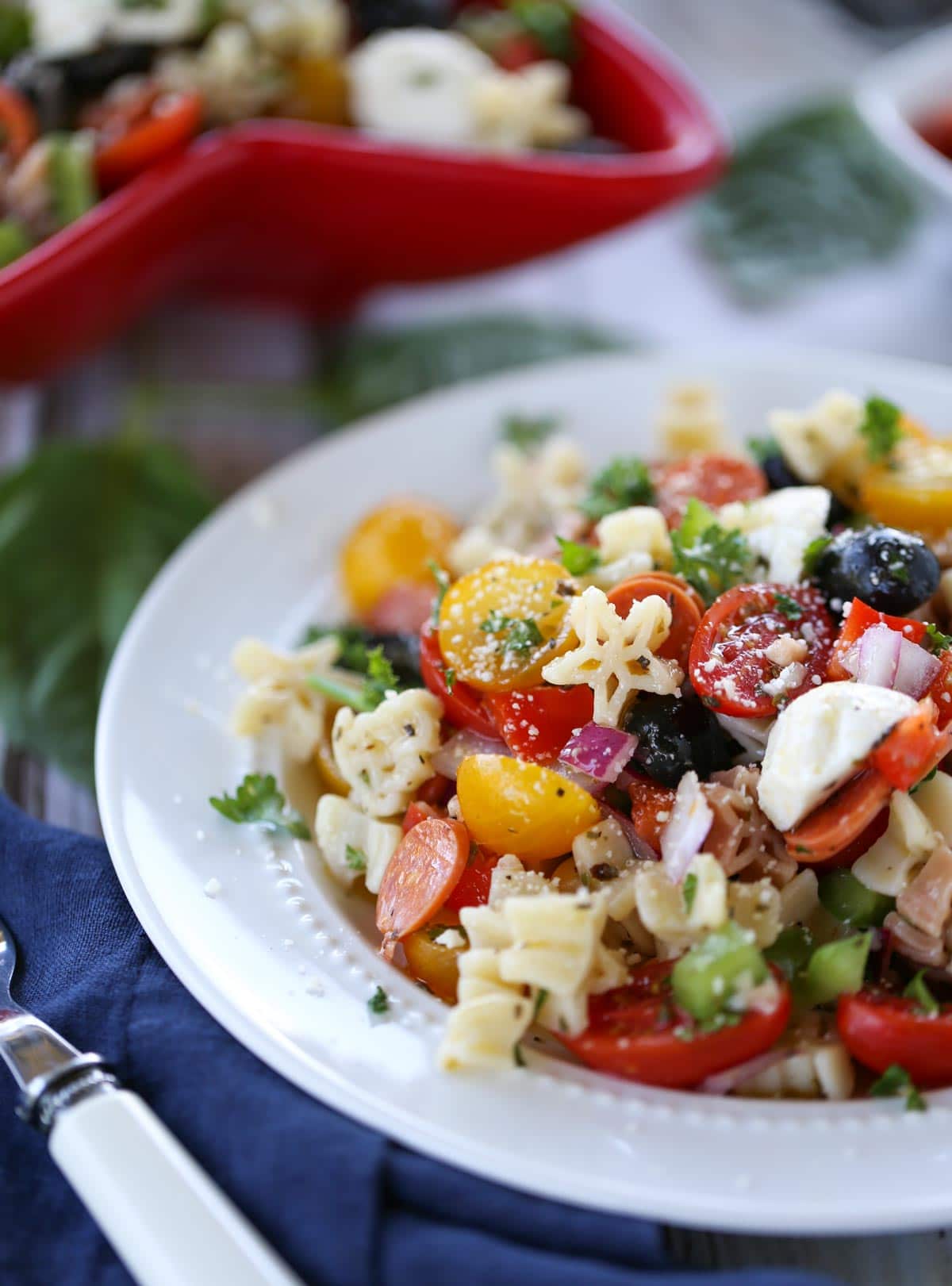 Supreme Pizza Pasta Salad | Delish combo of your favorite pizza ingredients! A simple side dish to any summer menu. Yum! The vinaigrette dressing ties it all together! | WorldofPastabilities.com