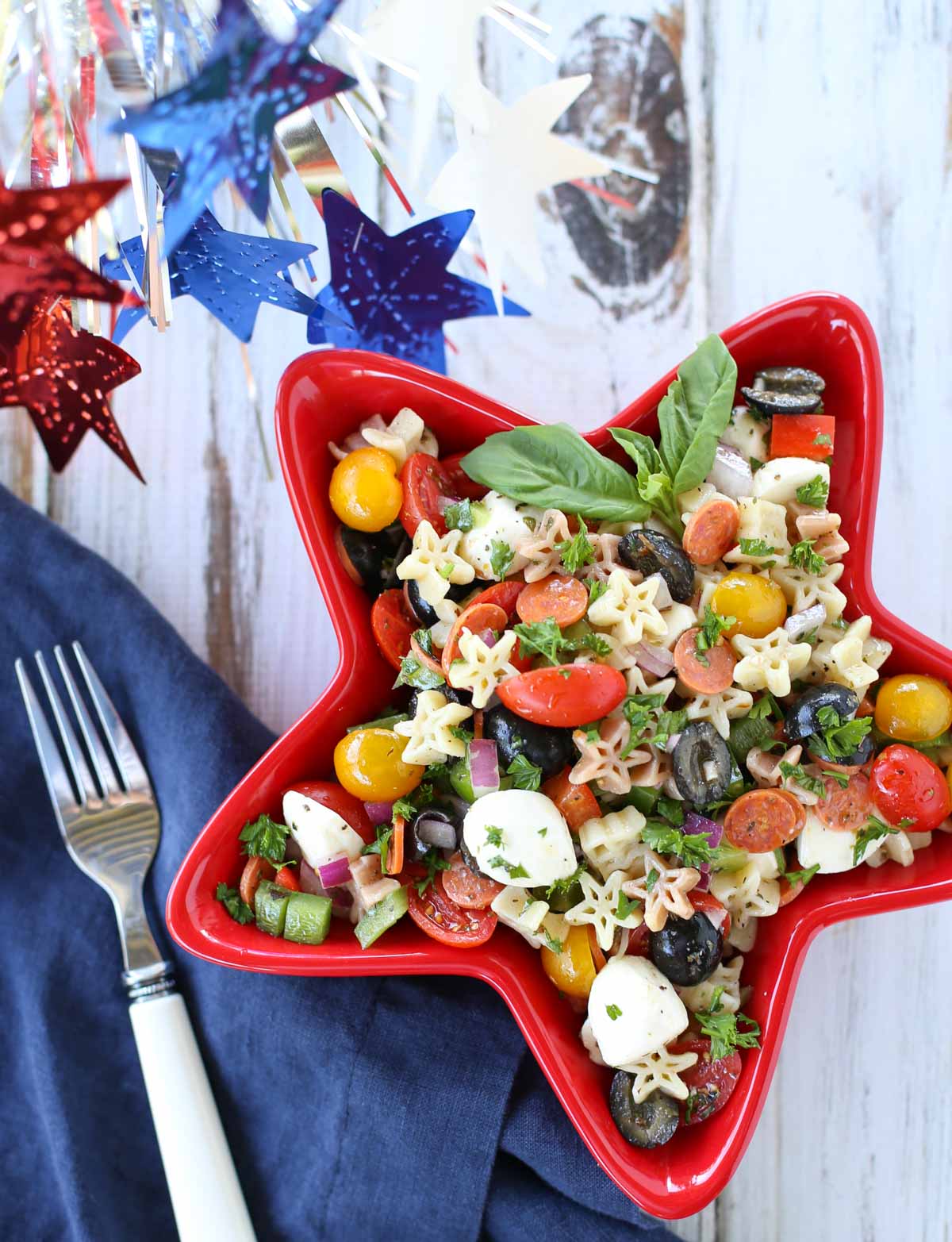 Supreme Pizza Pasta Salad | Delish combo of your favorite pizza ingredients! A simple side dish to any summer menu. Yum! The vinaigrette dressing ties it all together! | WorldofPastabilities.com