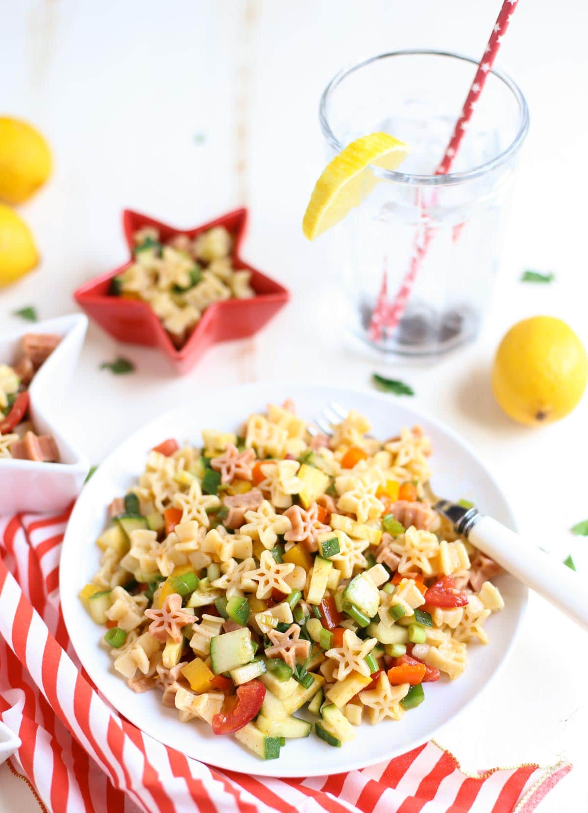 Fresh & Light Veggie Pasta Salad with Spicy Lemon Dressing | A light but flavorful dish featuring diced veggies and delicious pasta! Great with grilled meats or BBQ | WorldofPastabilities.com