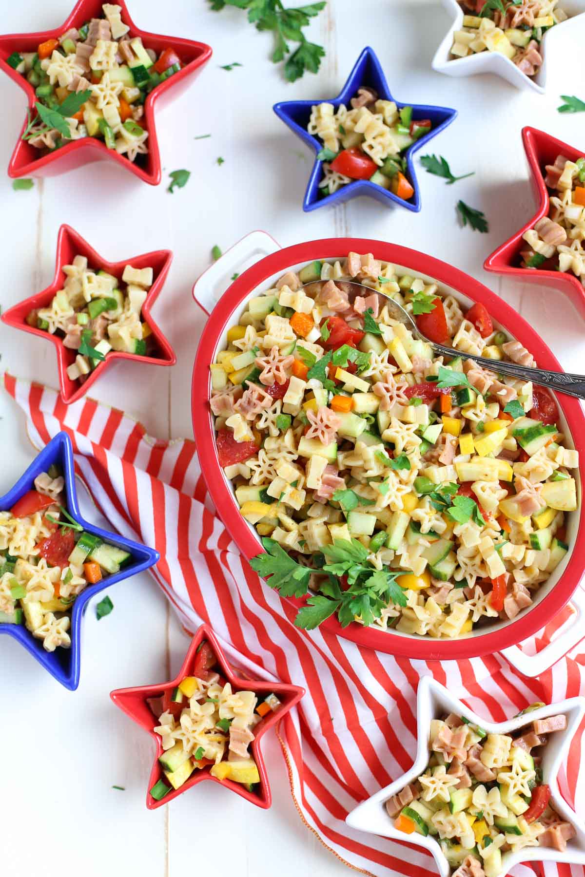 Fresh & Light Veggie Pasta Salad with Spicy Lemon Dressing | A light but flavorful dish featuring diced veggies and delicious pasta! Great with grilled meats or BBQ | WorldofPastabilities.com