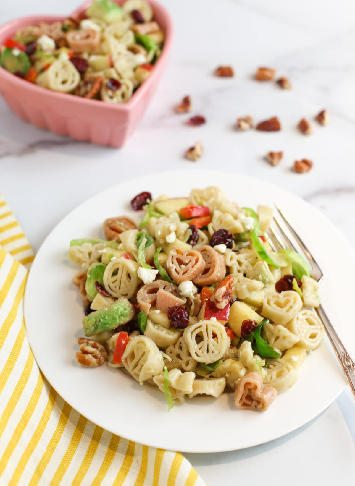 Close up of white circle plate of Peace Pasta 