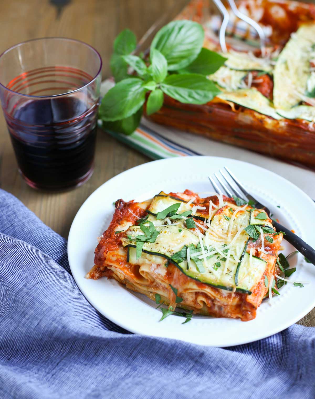 Zucchini Lasagna | Have you ever seen such a pretty lasagna? The Zucchini ribbons woven into a lattice pattern adds to the decadent taste of this dish! A crowd favorite for any event! WorldofPastabilities.com