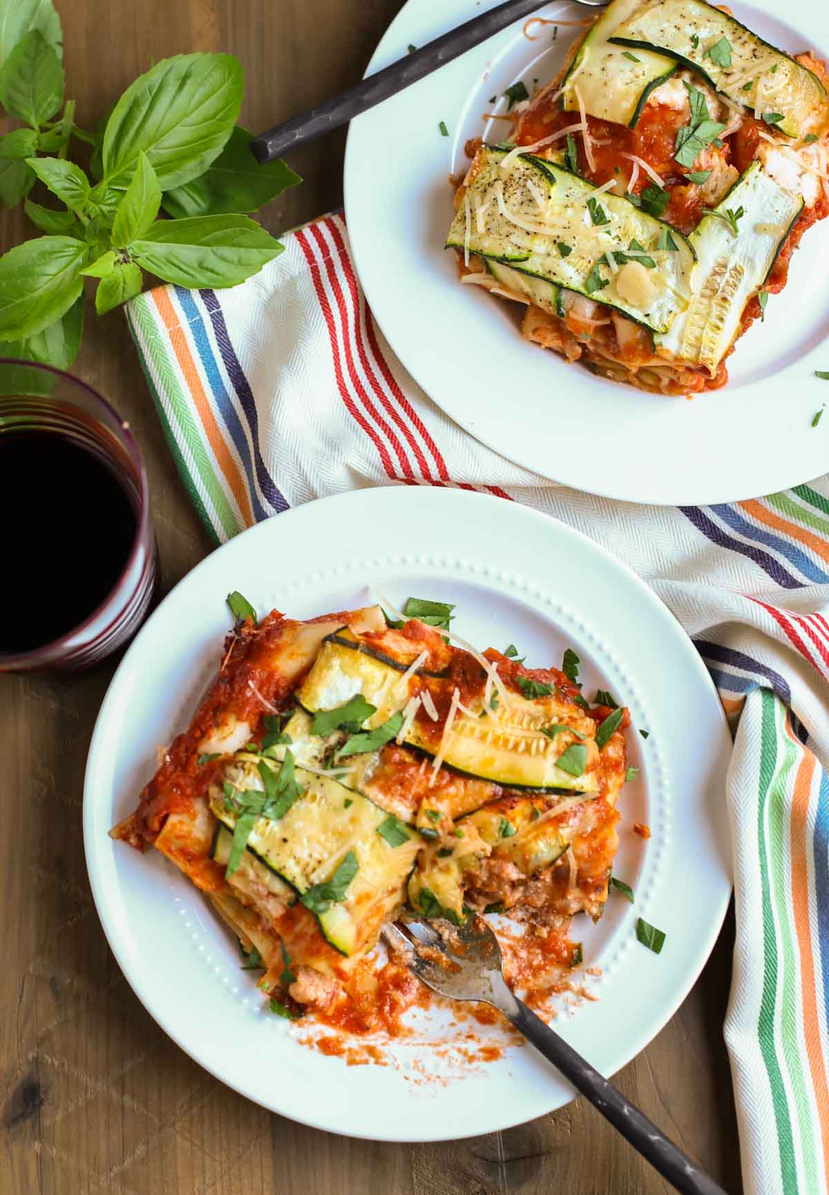 Zucchini Lasagna | Have you ever seen such a pretty lasagna? The Zucchini ribbons woven into a lattice pattern adds to the decadent taste of this dish! A crowd favorite for any event! WorldofPastabilities.com