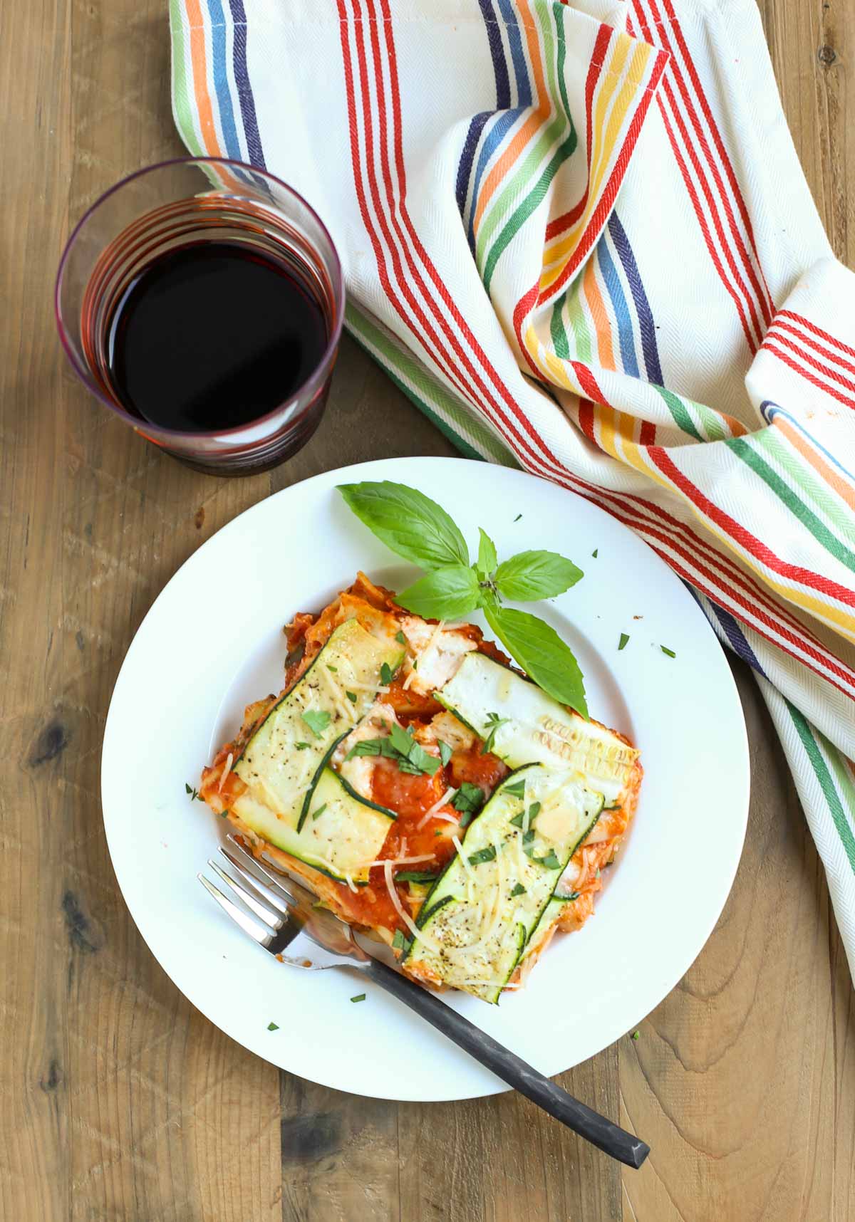 Zucchini Lasagna | Have you ever seen such a pretty lasagna? The Zucchini ribbons woven into a lattice pattern adds to the decadent taste of this dish! A crowd favorite for any event! WorldofPastabilities.com