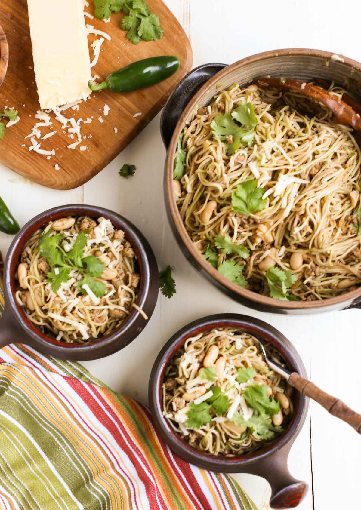 Hearty and subtle pasta dish blending flavors of a chili and spaghetti! Delish! Beans, ground chicken, and lots of spices with Angel Hair Pasta - yum! | WorldofPastabilities.com