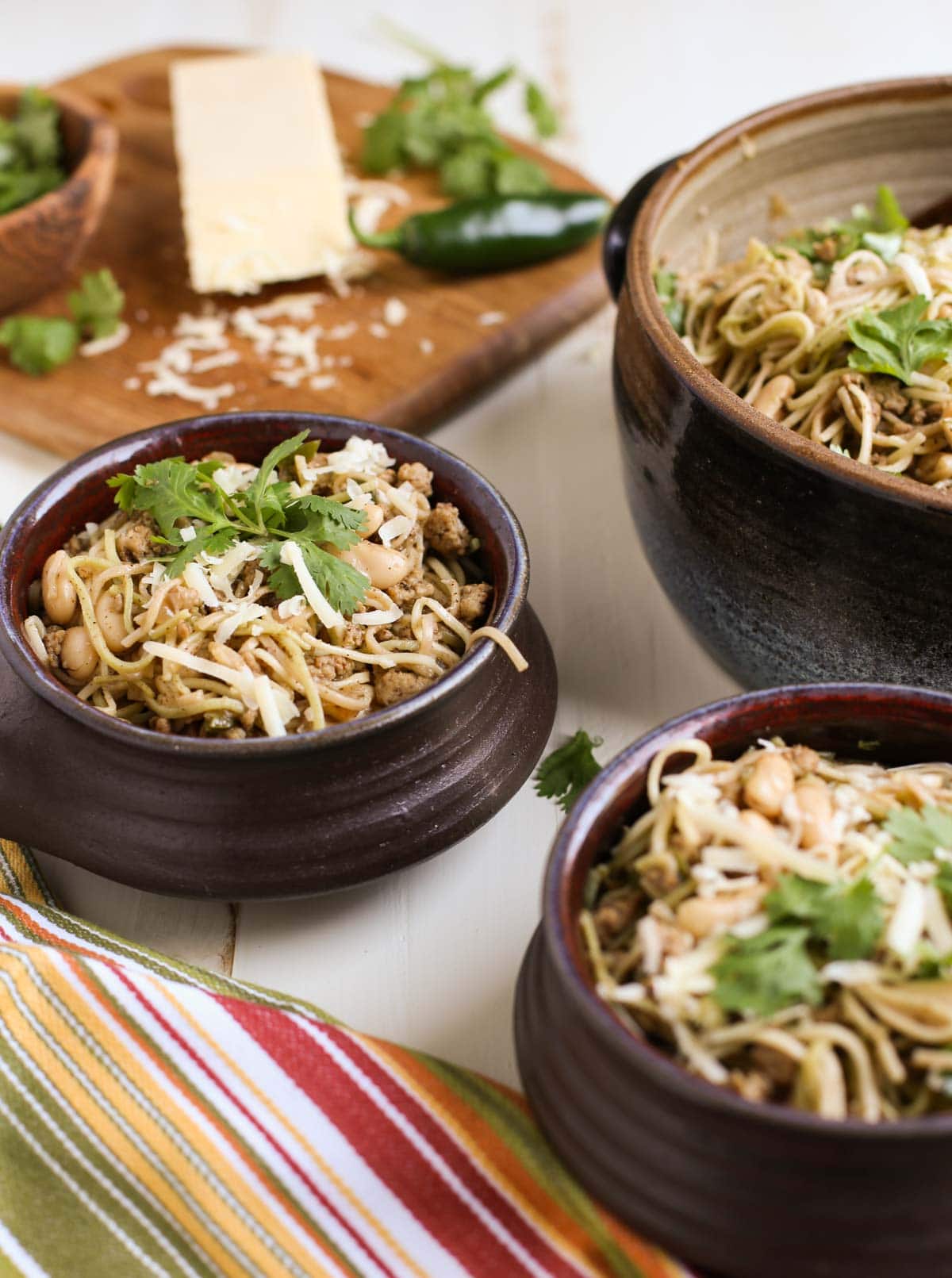 Hearty and subtle pasta dish blending flavors of a chili and spaghetti! Delish! Beans, ground chicken, and lots of spices with Angel Hair Pasta - yum! | WorldofPastabilities.com