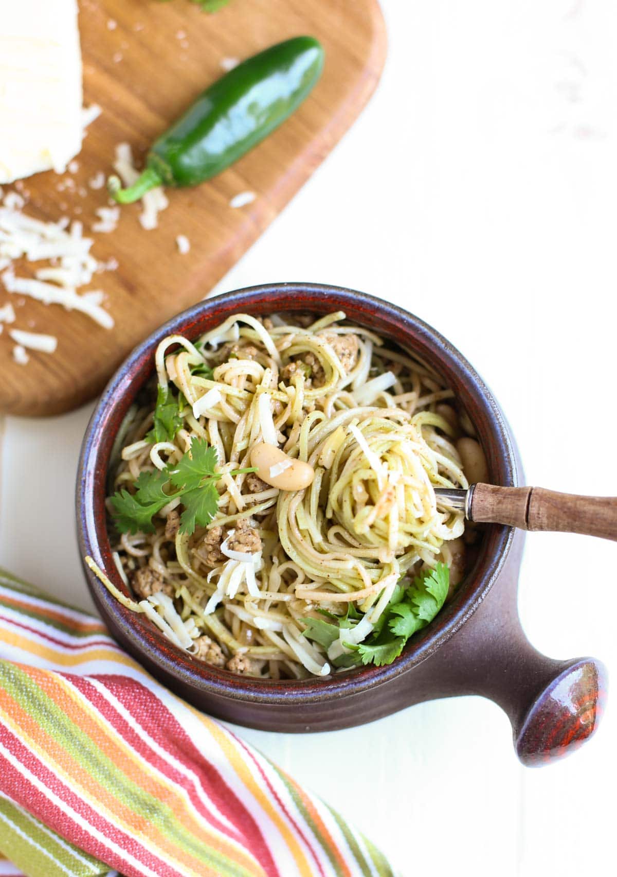 Hearty and subtle pasta dish blending flavors of a chili and spaghetti! Delish! Beans, ground chicken, and lots of spices with Angel Hair Pasta - yum! | WorldofPastabilities.com